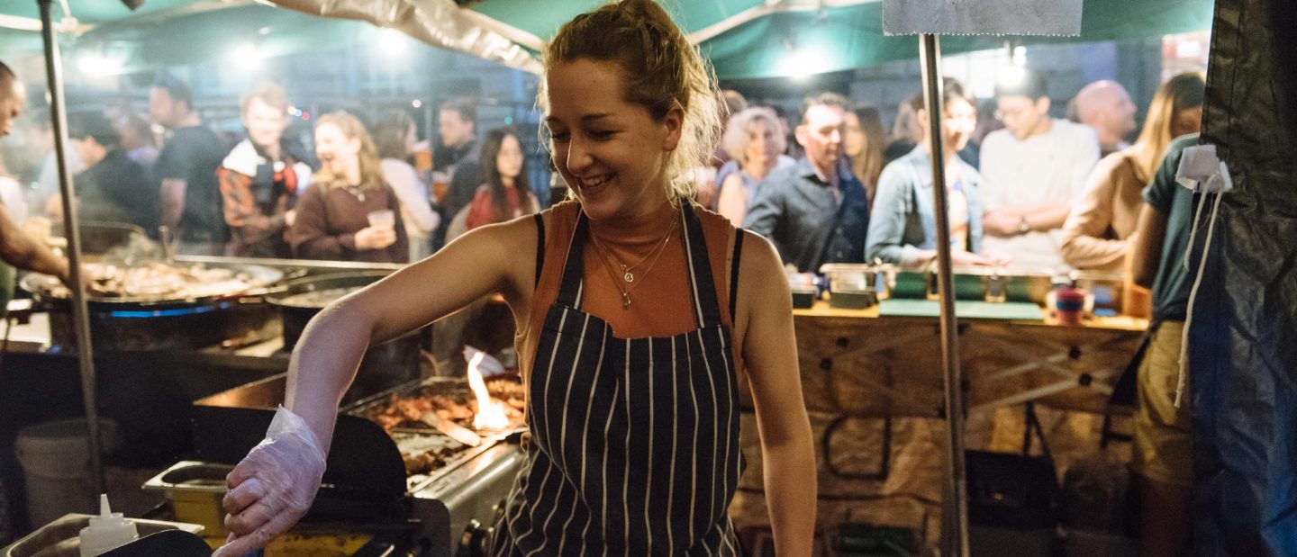 Serving food at the St Nick Night Market